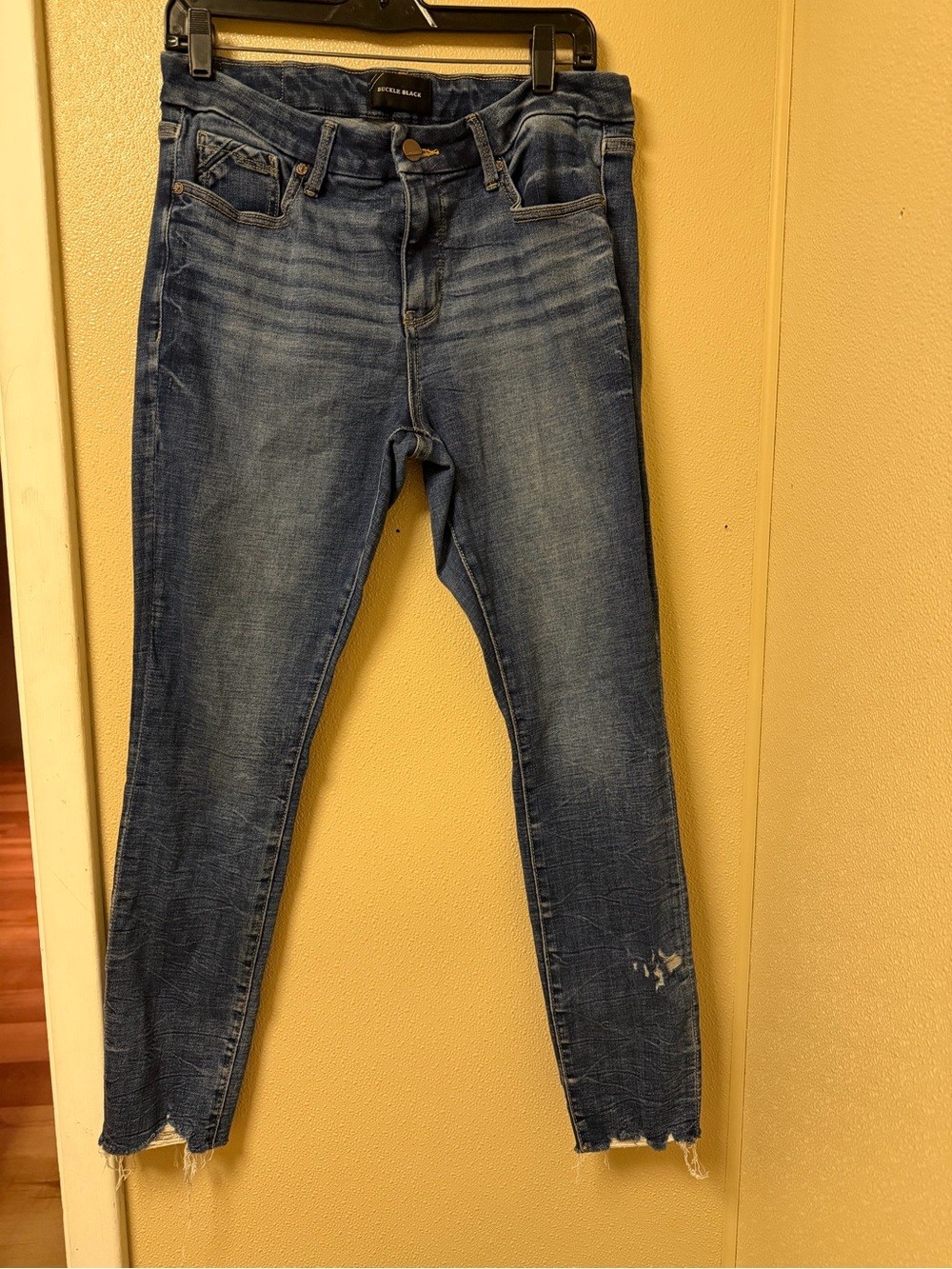 Buckle Medium Blue Women's Skinny Jeans with Subtle Distress - Picture 2 of 9